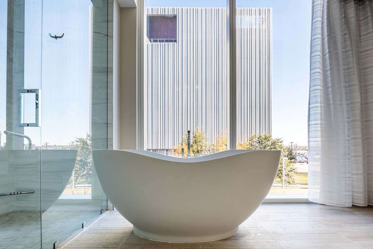 And who doesn’t love a deep tub with a view?