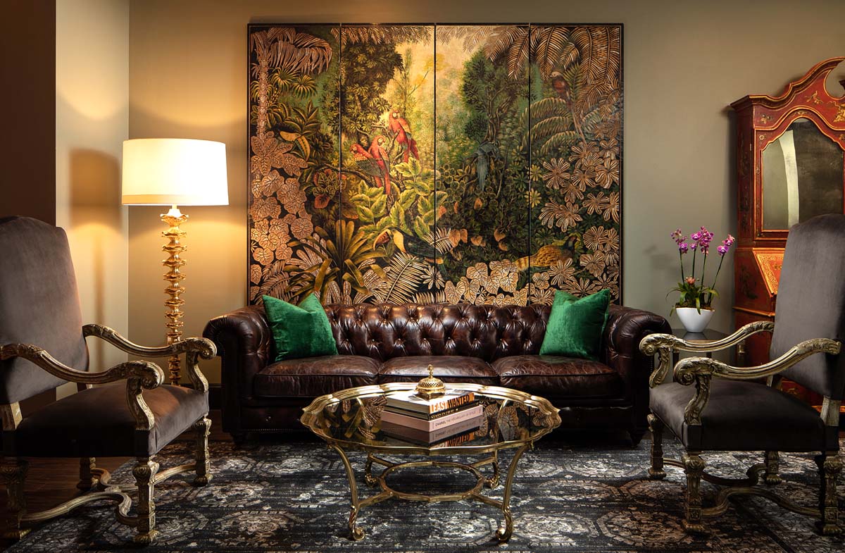 The Magnificent Seven Orient Express sitting room is decked in rich fabrics and deep colors